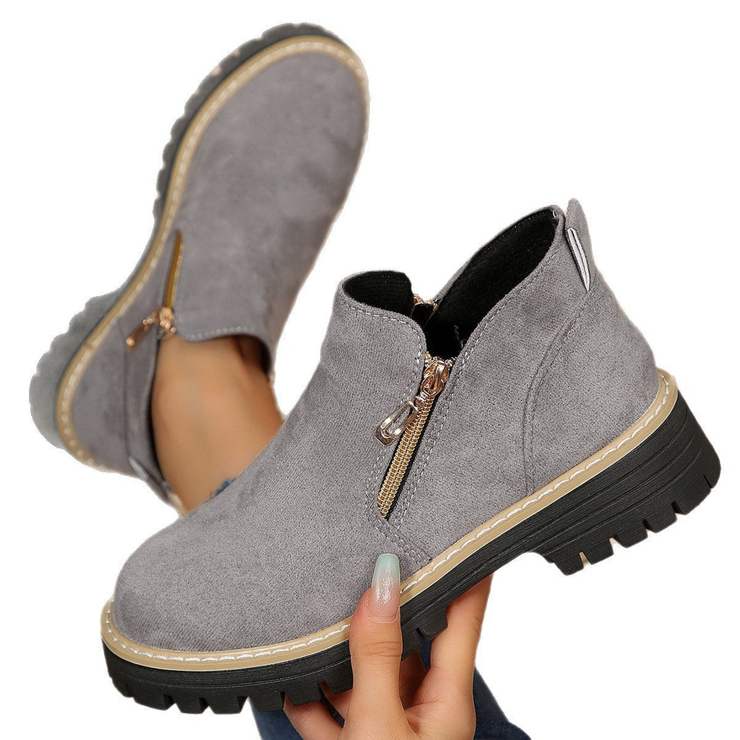 Stiefeletten für Damen mit seitlichem Reißverschluss und grober Sohle