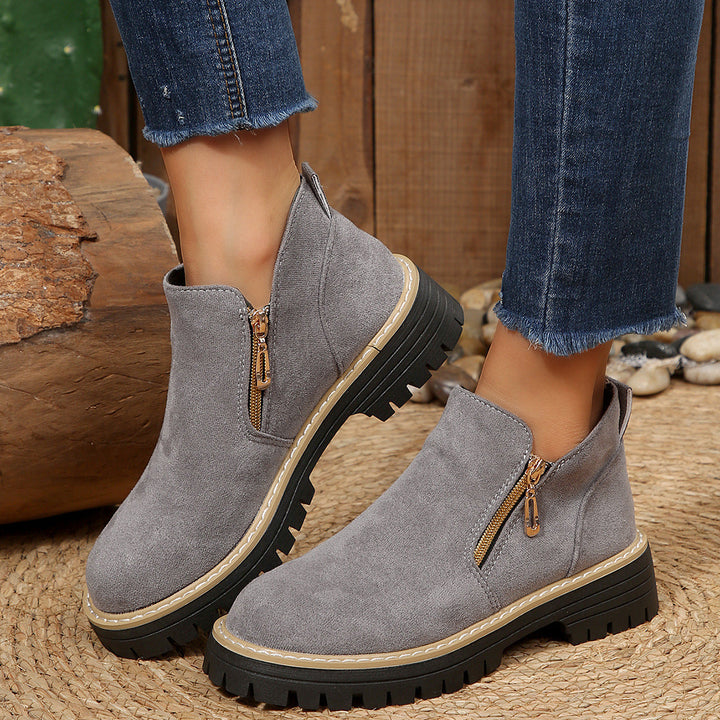Stiefeletten für Damen mit seitlichem Reißverschluss und grober Sohle