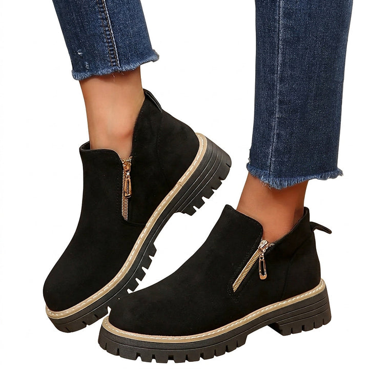 Stiefeletten für Damen mit seitlichem Reißverschluss und grober Sohle